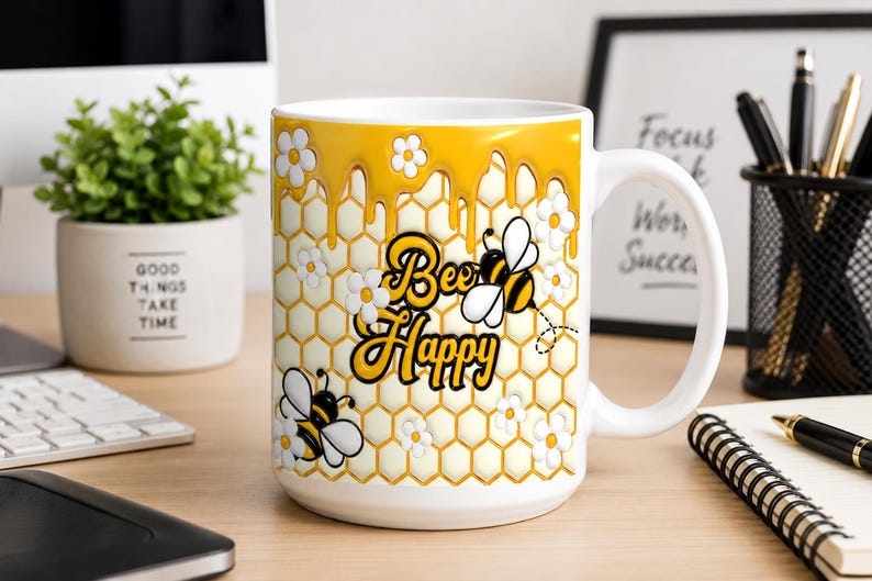 Bee Happy white ceramic coffee mug in a bright office setting