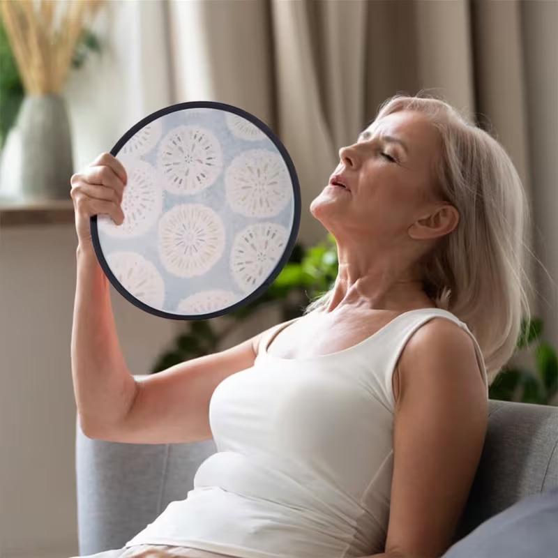 Round foldable disc hand fan printed with a custom pattern