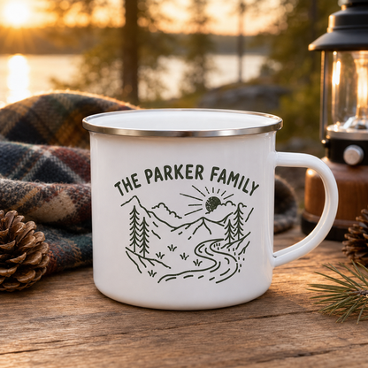 Personalized family enamel camping mug at a lakeside campsite
