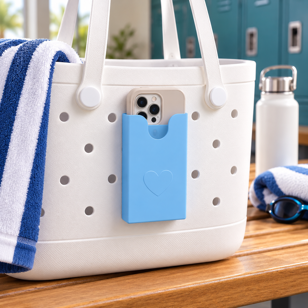 Blue phone holder mounted on white perforated tote
