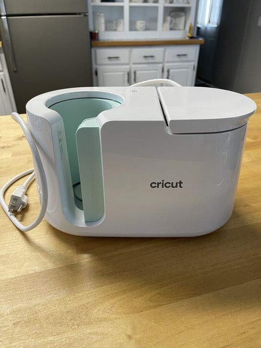 Cricut Mug press used like new - includes silicone wraps and 6 blank white mugs