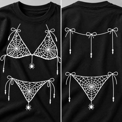 Close-up details of front and back white spider-web prints on black shirt